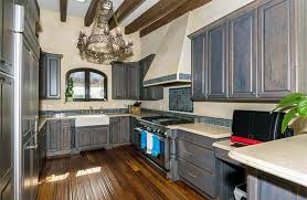 The grey shaker cabinets, light tile floor, and white countertop all have similar color tones. Distressed Kitchen Cabinets Design Pictures Designing Idea