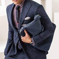 Grab the tips of the left side of your pocket square and fold them over to the right side. How To Fold Your Pocket Square Gq