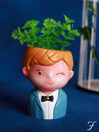 For plants and flowers alike. Handmade Cute Boy Shape Pot Resin Planter Blue Floren
