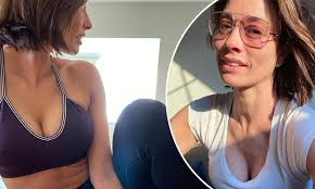 Melanie Sykes, 49, shows off her washboard abs in a crop top