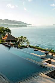 Amankila Set On The Unspoiled Eastern Coast Of Bali It S Only Appropriate That The Design Of Amankila S Main Pool Was In Hotel Pool Hotel Swimming Pool Pool