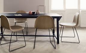 For tables over 48 long, table base legs are connected to each other with a 3 c channel crossbar. Gubi 3d Sled Base Wood Dining Chair Hivemodern Com