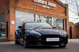 Image result for Marron Black 2017 Aston Martin