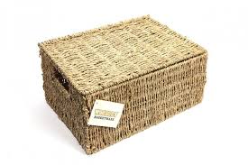 Large rattan floor baskets are the ideal home for extra blankets and throw pillows. Woodluv Seagrass Storage Basket With Lid Elite Housewares