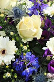 Maybe you would like to learn more about one of these? Mixed Flower Arrangement Wedding Flowers In White And Purple Blue Stock Photo Picture And Royalty Free Image Image 82104829