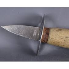 Couteau à huître avec un butoir en cas de dérapage. Couteau A Huitre Ancien Pradel Bois Et Inox