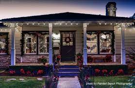 Christmas decorations on ranch house. Outside Christmas Light Ideas Houses Decorated With Christmas Lights Decorating With Christmas Lights Christmas Light Installation Christmas Lights