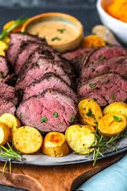 With this recipe, your beef tenderloin will have the perfect garlic and thyme crispy crust on the outside and a tender, juicy, medium this sounds amazing! A Plate Of Beef Tenderloin With Potatoes Beef Tenderloin Recipes Best Beef Tenderloin Recipe Pork Tenderloin Recipes