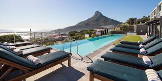A quartz crystal ground in the shape of a rectangular parallelepiped, which vibrates strongly at one frequency when electric voltages of that frequency are placed across opposite sides: The Crystal Apartments Appart Hotels Cape Town
