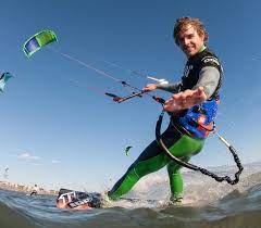 Kiteboarding many times said kitesurfing, is an extreme sport where the kiteboarder harnesses the power of the wind with a large controllable power kite (wing) to be propelled across the water, land. Barcelona Kiteboarding Holiday In Spain Best Kitesurfing City Break