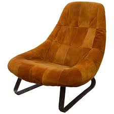 A group of six chairs, beech wood, foam padding, fabric upholstery. 1970s Suede Scoop Lounge Chair At 1stdibs