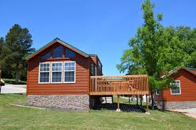 There's fun for all ages with mini golf and a children's pool, and barbecue grills are available on site. New Bluegrass Cabins Jellystone Park Of Mammoth Cave In Ky Jellystoneky 800 523 1854 Cave City Jellystone Park Mammoth Cave