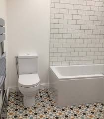 Updated the tile flooring cost by type of tile section with a table and subsections. Professional Tiling Services In Lagos Nigeria