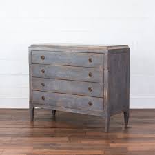 Four drawers run smoothly on metal glides, offering easy access to storage for clothing and bedroom items, all in a compact footprint for any bedroom size. Four Drawer Chest Pewter Dixon Rye