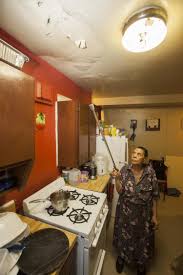 Tenants Of Nycha Building In Harlem Fear Asbestos As They Wait For Roof Repairs Roof Repair Tenants Kitchen Ceiling