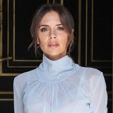 The Beckhams The front row at the Victoria Beckham