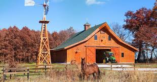 The original idea was a simple metal shed to store the airfield's mower and tools. Timberlyne Custom Post Beam Barns