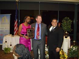 Jennifer Victor & Eric Maldonado with Rich McDaniel, center