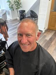 Quiffs and curls added a new photo.