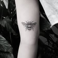 Small Black And Grey Bee Tattoo On The Right Arm Bee Tattoo Black Ink Tattoos White Tattoo