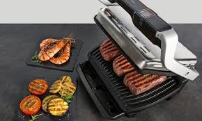 The optigrill features a powerful 1800 watt heating element, user friendly controls ergonomically located on the handle, and die cast aluminum plates with. Tefal Optigrill Vs Ninja Health Grill Low Fat Grills Go Hi Tech Which News