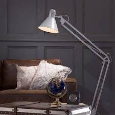 It's practical to have additional ceiling light sources spread across the room in order to create a comfortable ambiance. A Guide To Living Room Lighting Litecraft