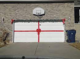 Make Your Garage Door A Giant Present At Christmas Time Garage Door Christmas Decorations Christmas Decorations Diy Outdoor Outdoor Christmas Decorations