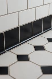 This tile works equally well on walls, floors, or backsplashes. Classic Black And White Bathroom Tile Design Rookwood Tile Black And White Tiles Bathroom Small Bathroom Makeover Bathroom Tile Designs