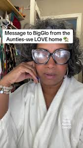 Sweet Old Lady in Robe with Linens and Advice