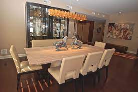 Hardwood floor wood floor plan ideas description: A Beige Wall Coordinates With Dark Wood Floors In This Contemporary Dining Room Off White Upholstery Dining Table Marble Contemporary Dining Room Wood Floors