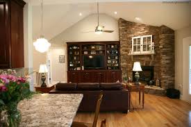Surrounds generally don't look right with a towering stone fireplace but are more at home with fireplaces that vent behind the wall. Great Room Stone Fireplace And Custom Built In Stockpiling Moms