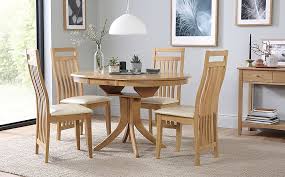 Get the best deals on dining room extending tables. Hudson Round Oak Extending Dining Table With 4 Bali Chairs Ivory Leather Seat Pads Furniture And Choice