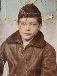 A pic of my dad at 14 in 1957 when he left ireland for England Manchester  to work ...he's passed now and we would love to have this pic as clear and