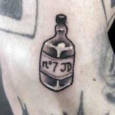 Usually, tattoos of the bottles are done in black and grey, with a sort of honeyed gold color. Simple Jack Tattoo Tattoo
