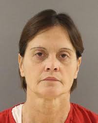 Murder suspect tells police husband's texting sparked fatal shooting