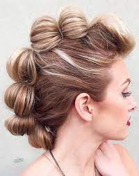 6 Effortless Updos You Can Rock With Short Hair It Doesn T Matter If You Re Looking For A Chic Elabor Short Hair Updo Faux Hawk Hairstyles Medium Hair Styles