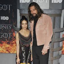 In emilia's photo, jason is literally sweeping the mother of dragons off her feet. Jason Momoa Praises Emilia Clarke After Near Death Experiences