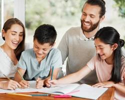Image of Family writing together