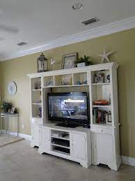Decor For Entertainment Center Beach House Pinterest Living Room Entertainment Center Decorating Top Of Entertainment Center Living Room Entertainment