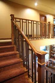 Stair Systems Craftsman Style Stair Case With A Mix Of Wood And Wrought Iron Bayer Built Woodwork Stair Railing Design Craftsman Staircase Staircase Design