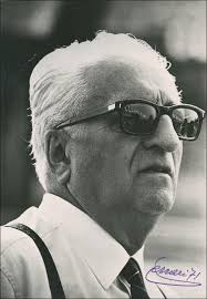 Why does enzo ferrari wear eyeglasses? Enzo Ferrari