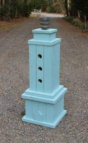 Illustrated woodworking plans for a painted wooden yard lighthouse. Diy Lighthouse From Treated 2x4 Lumber Lighthouse Woodworking Plans Diy Plans Wood Lighthouse