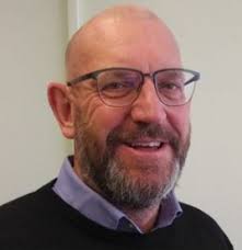 Dr Mark Harrison, MB.BC, PhD, FRCP, FRCR