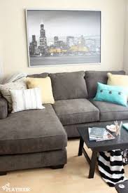 Sofa with throw pillows lined along the back with 2 brown pillows on top for a symmetric throw pillow design. 26 Best Pillows For A Dark Gray Couch Ideas Dark Grey Couches Pillows Grey Couches