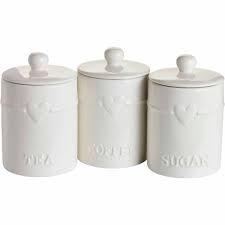 Tea coffee sugar ceramic canisters engrave heart kitchen storage jars set of 3kitchen canisters with wooden lid.store tea, coffee and sugar in these unique kitchen canisters.featuring stylish wooden lids, these canisters are perfect for a contemporary kitchen.available designs:heart3 piece set. Wilko Cream Heart Tea Canister Wilko