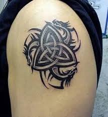 Small tribal dragon tattoos ideas for men on arms. 9 Most Stunning Tribal Dragon Tattoo Designs Styles At Life