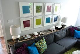 Position a lamp on one side of the table to create a striking look, or place lamps on either side of the table to make a symmetrical look. What To Put On A Console Table Behind A Couch Young House Love