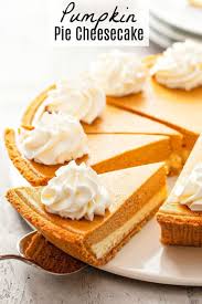 This Phenomenal Pumpkin Pie Cheesecake Has A Thick Layer Of Cheesecake Topped With A L Easy Pumpkin Pie Thanksgiving Food Desserts Pumpkin Pie Cheesecake Easy