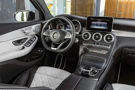 The New Mercedes Benz Glc Coupe Is Here The Sports Car Among Mercedes Benz Mid Size Suvs Impresses With Its Brand Typica Autos Y Motos Autos Interior De Autos