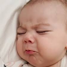 Baby displays wide range of emotions in her sleep